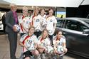 Spielerinnen der erfolgreichen Deutschen Damen-Fussballnationalmannschaft mit dem neuen Mercedes-Benz C-Klasse Coupé und Managerin Doris Fitschen